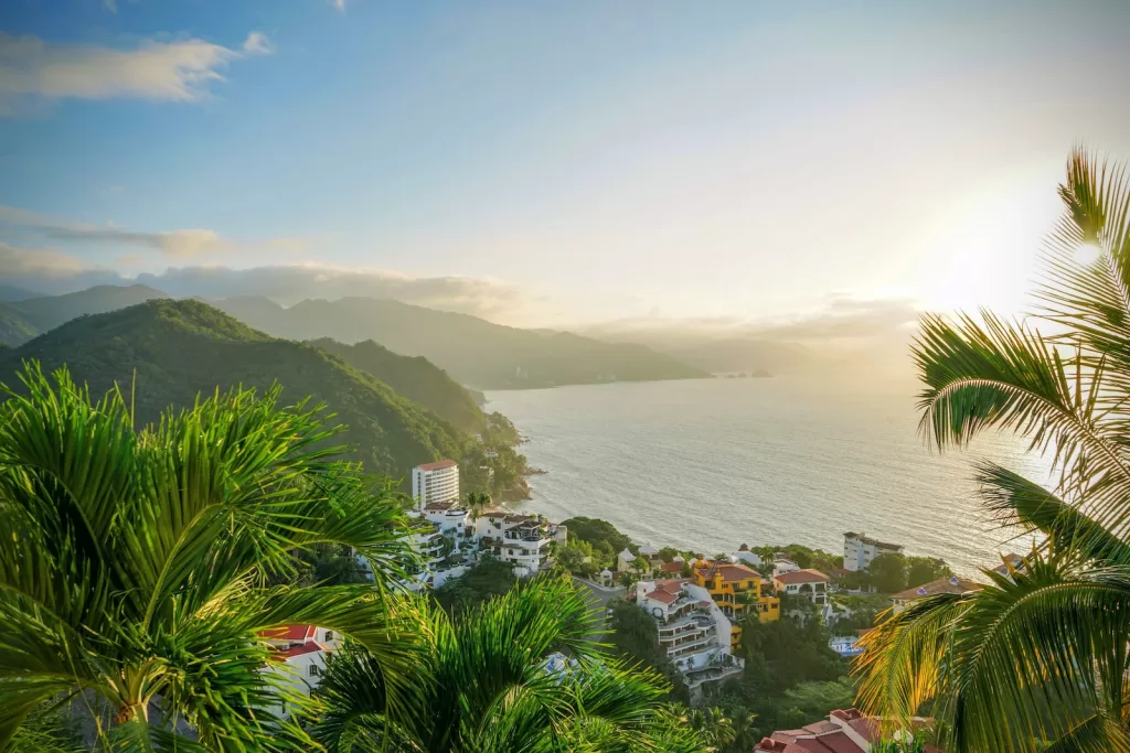 aerial photography of building beside sea during daytime Puerto Vallarta city safest cities in mexico