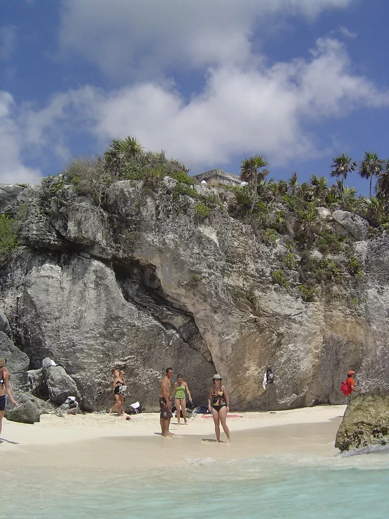 Exploring Mexico: A Journey through Diverse Destinations 2 Ancient stone ruins perched above the turquoise water and white sand of a Riviera Maya beach
