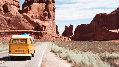 yellow Volkswagen van on road Living The Van Life