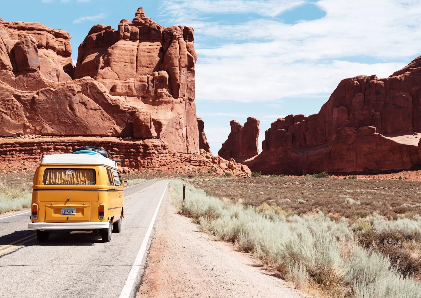 yellow Volkswagen van on road Living The Van Life