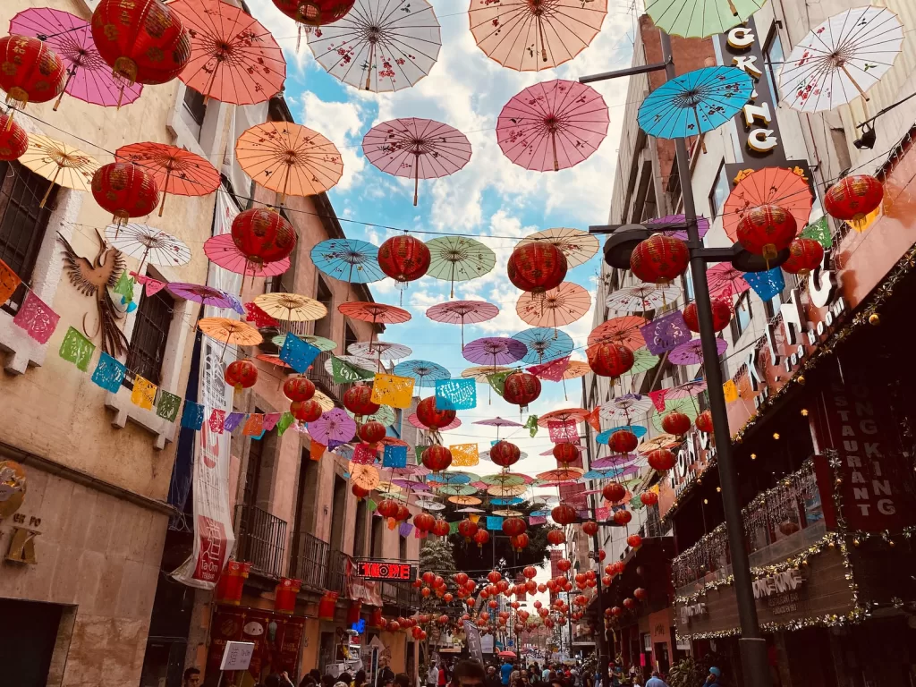 white and red paper lanterns Mexico City - living in mexico city pros and cons