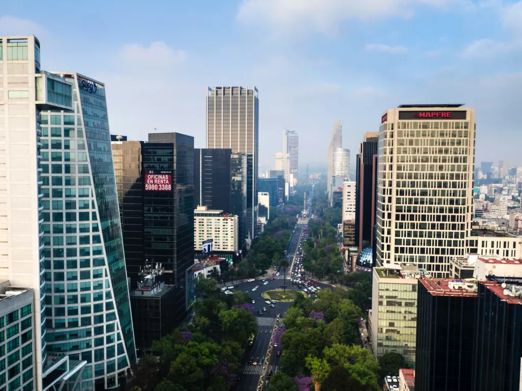 high rise buildings during daytime pros and cons of living in Mexico City