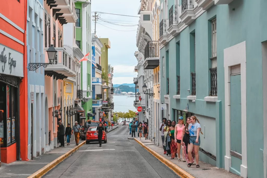people walking on street during daytime Puerto Rico fun facts