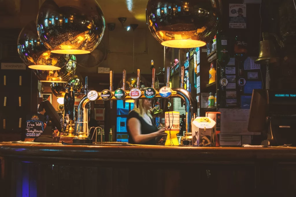 woman standing inside bar in guadalajara