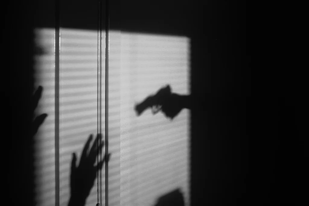 silhouette of person on window of a hotel is safe in cabo