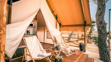 white and brown patio umbrella glamping in mexico