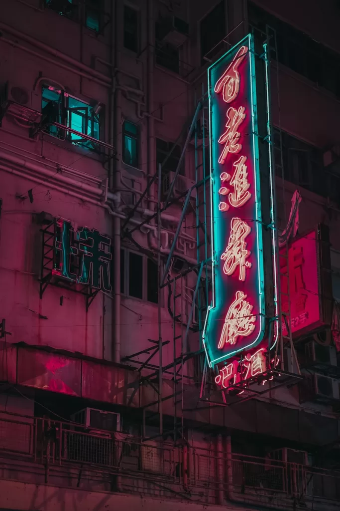 turned-on kanji script neon signage at the building and hello in Asia