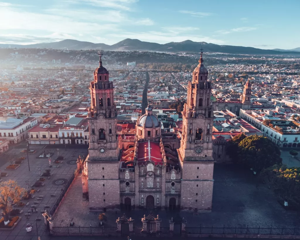 brown and white concrete castle in Morelia mexico