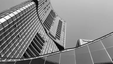 grayscale photo of high rise building in Zapopan