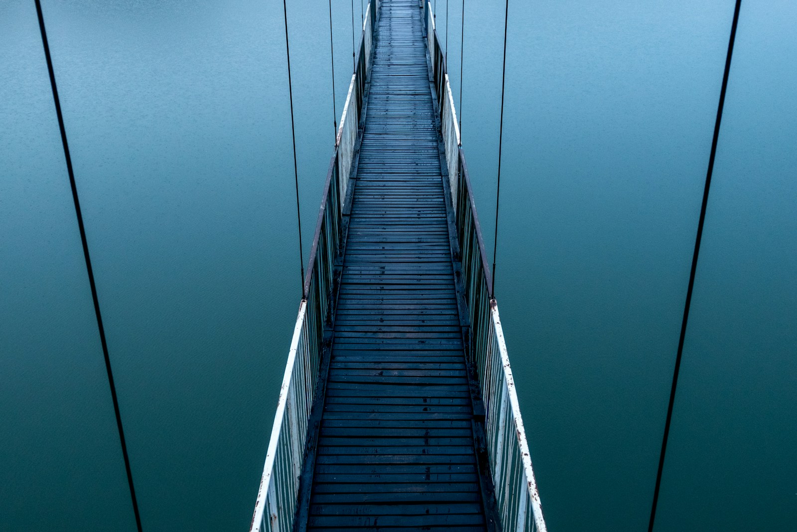 empty bridge over water Jorullo Bridge