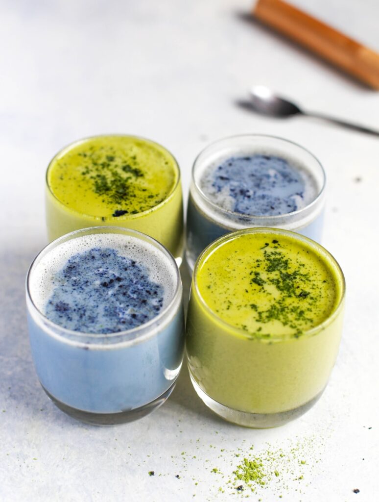 two green and blue liquid in glasses Matcha Tonic