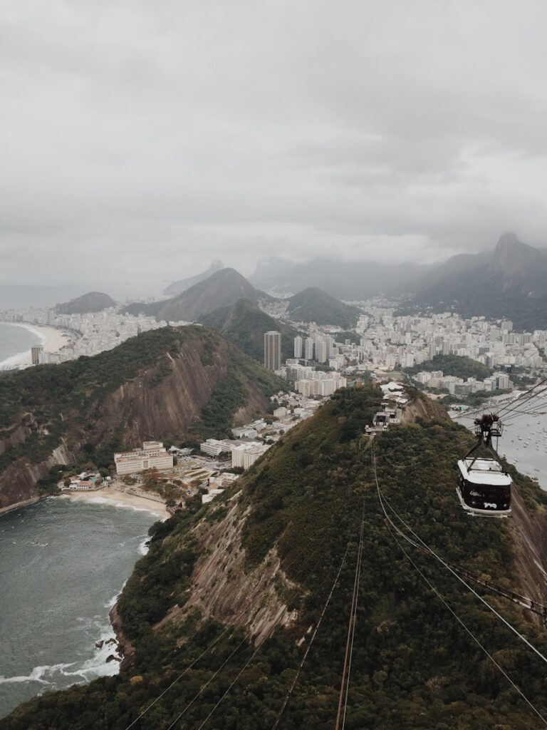 aerial photography of cable car above tree  covered mountain in Cerro de la Silla