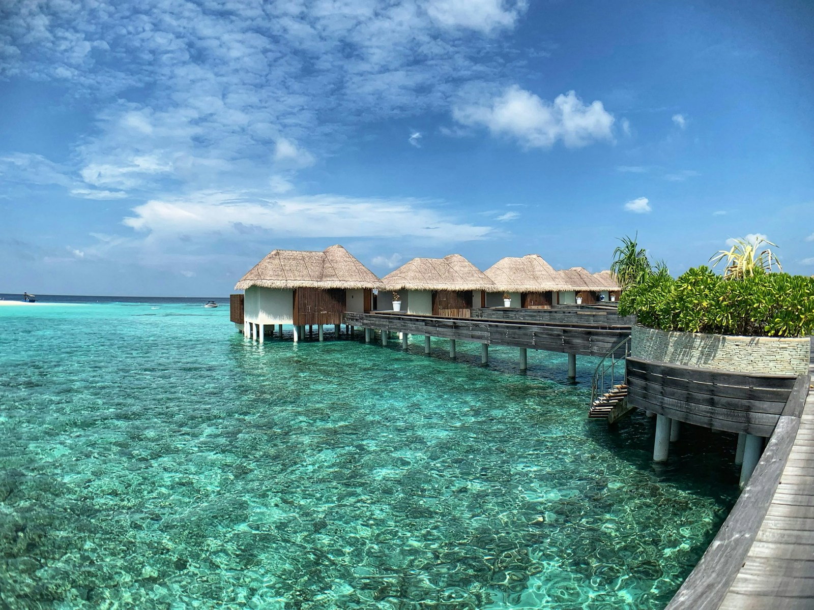 brown wooden house on body of water under blue sky during daytime Travel Bucket List