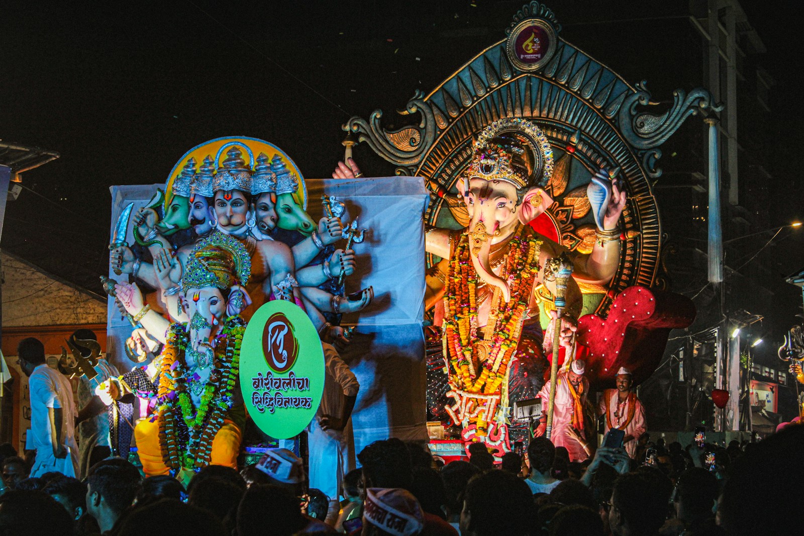 A group of people standing around a stage