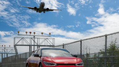 a helicopter flying over a car Ensenada Airport