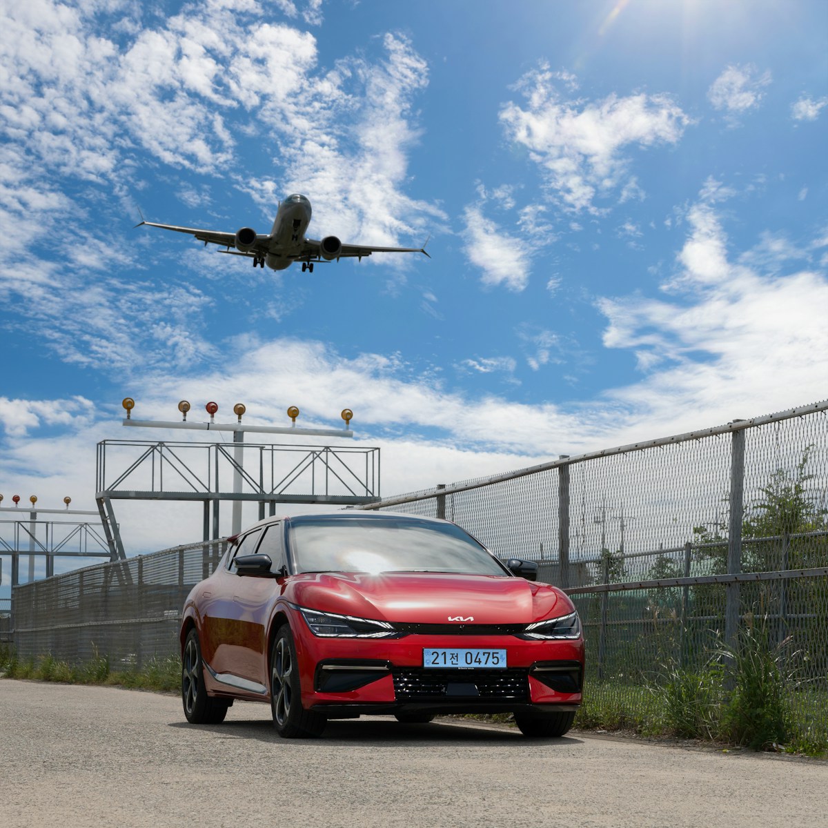 a helicopter flying over a car Ensenada Airport