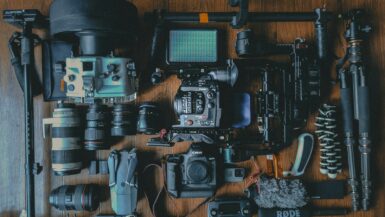 flat lay photography of cameras and camera gear Travel Photography