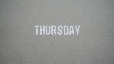 the word thursday cut out of paper