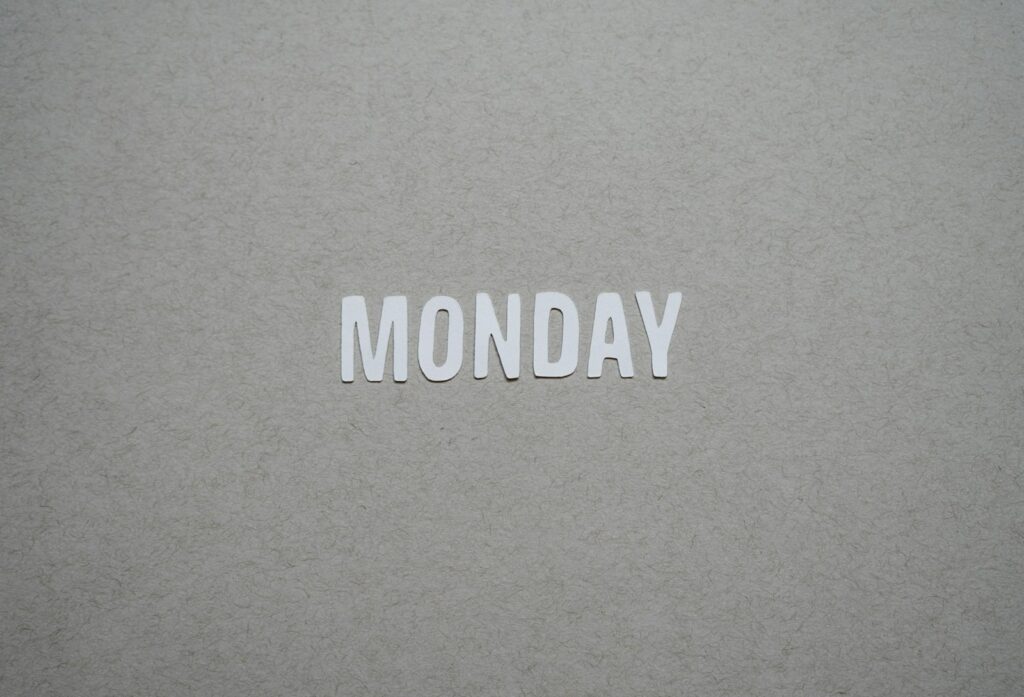 the word monday is cut out of white paper